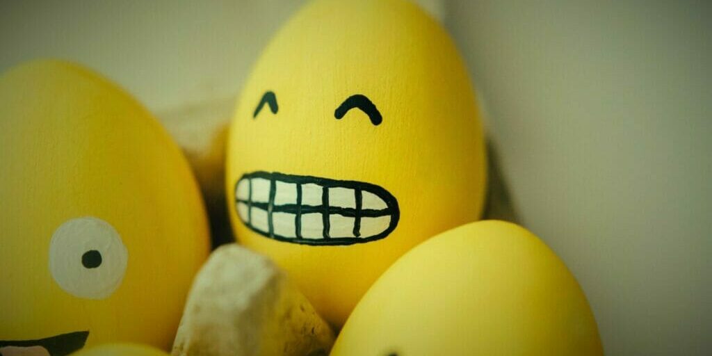 Eggs with a grimace emoji painted on it. Assess Morale: Know When "They" Aren't Happy